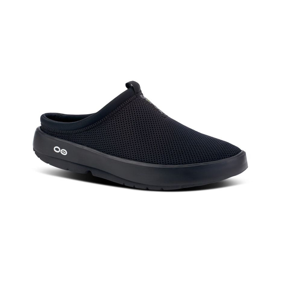 5275BLACK_shot2_932x680_69653efb-dae2-41f9-a5bc-be368c75ef58 OOFOS Men's OOcoozie Sport Mule Slipper in Black - Image 1